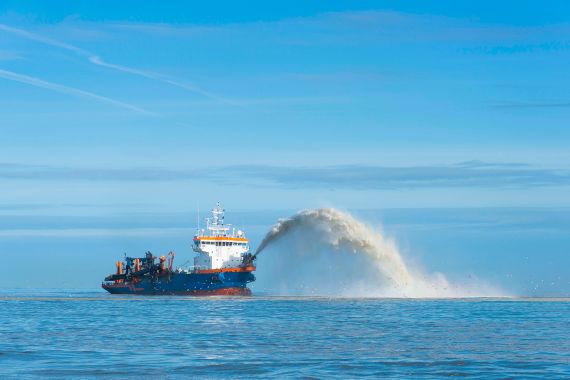 Coastal protection: rainbowing trailing suction hopper dredger